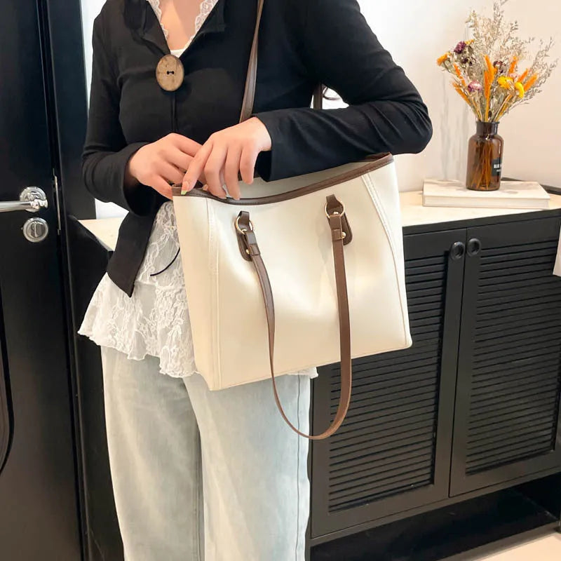 PU leather tote bag with contrast colour trim and internal mobile phone and document compartments