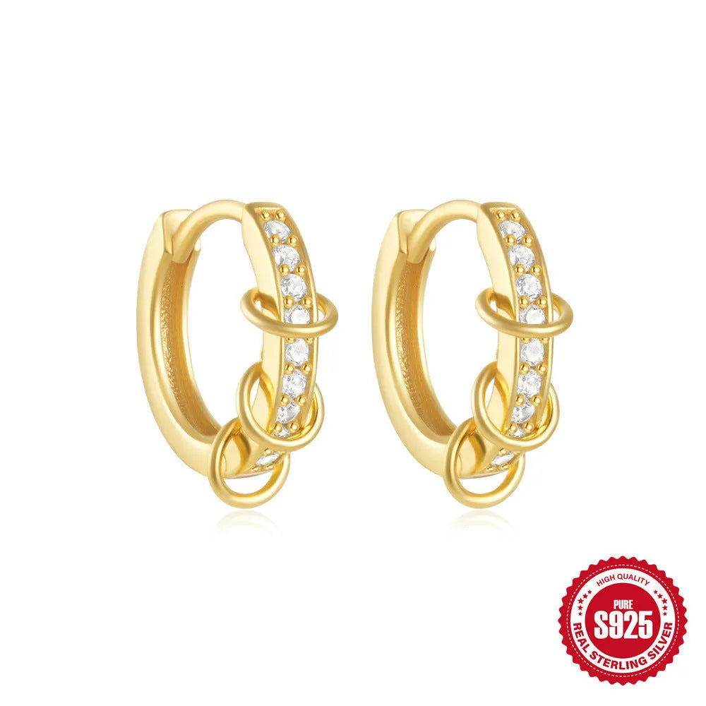 Sterling silver geometric stud earrings with small round diamond detailing in gold and silver electroplated finishes