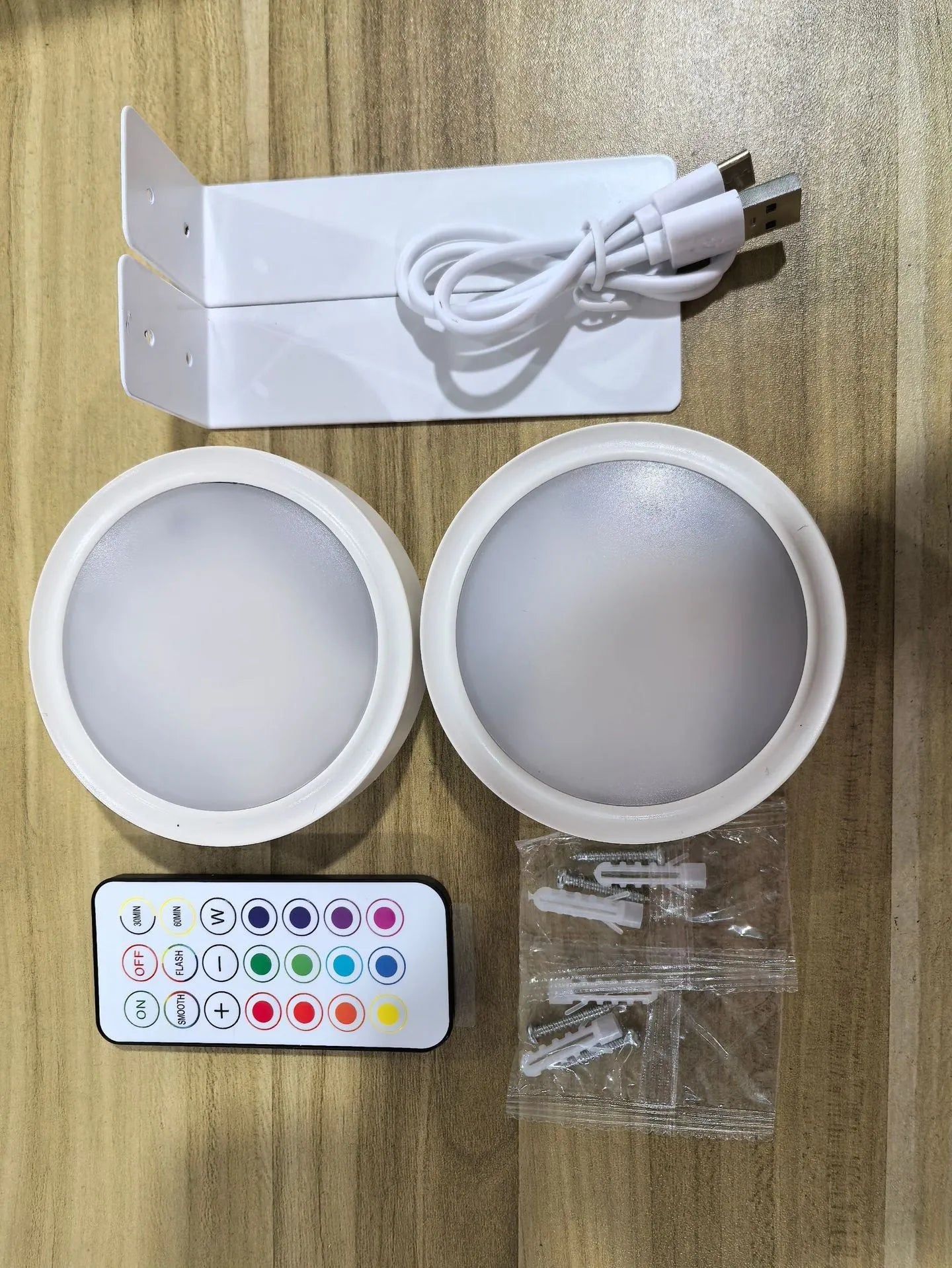 Wireless LED painting lamp with magnetic charging and remote control in black, white or gold finish