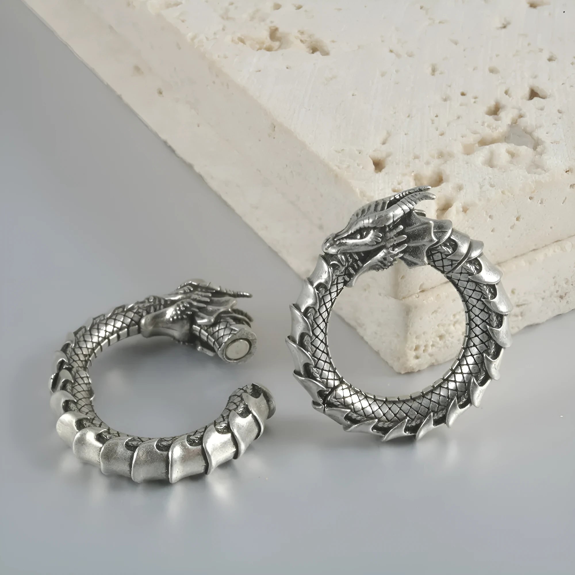 Geometric hollow-out earrings with antique silver dragon finish in copper auricle style