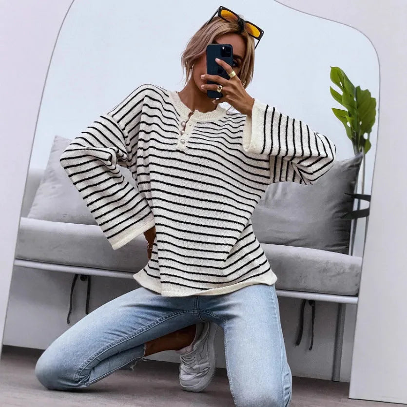 Black striped women's loose top with drop-shoulder sleeves and button detail