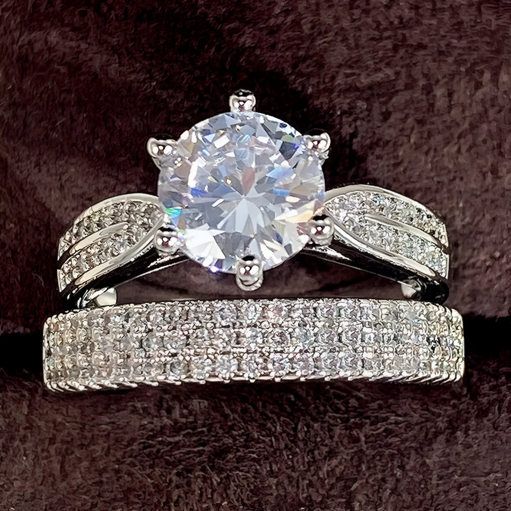 White gold colour geometric wedding combined ring bracelet with round details on a hand.