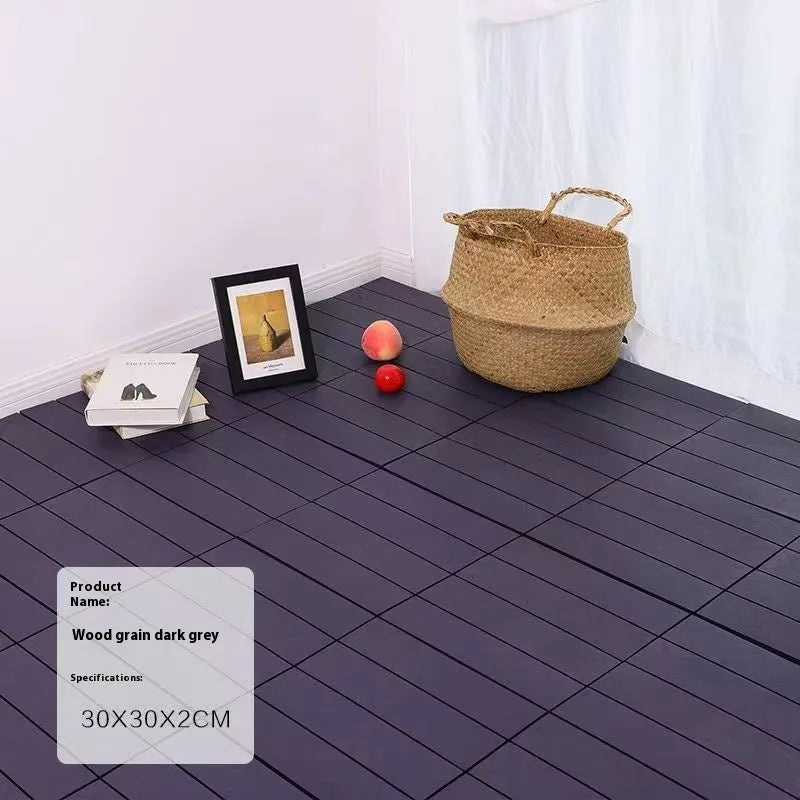 Ten square plastic floor tiles with a wood grain pattern, showing a non-slip surface.
