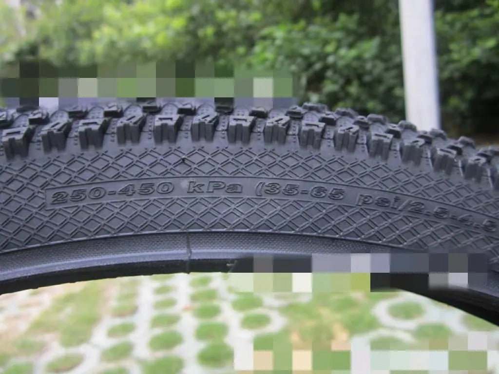 Ultralight puncture resistant mountain bike tyre shown in multiple sizes including 26, 27.5, and 29 inch diameters.