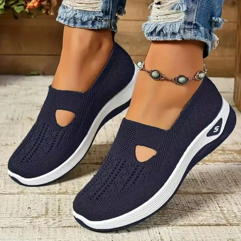 Women's casual mesh shoes with T-strap design and soft PVC soles in light purple colour