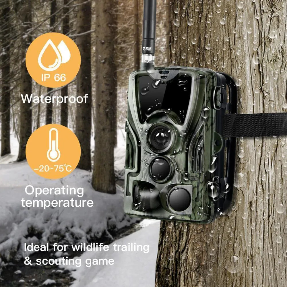 Green cellular trail camera with belt and tripod mount for hunting and wildlife monitoring
