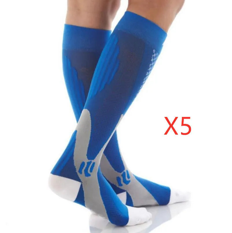 Athletic fit graduated compression socks for men and women in black, shown on a leg.