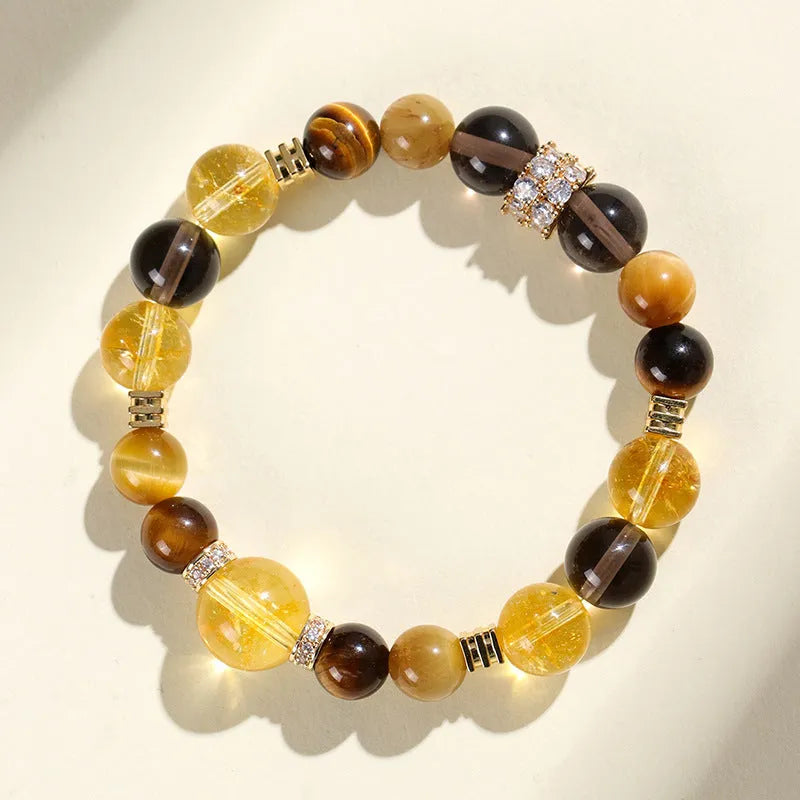 Handmade yellow artificial crystal bead bracelet with 10mm Jinba style beads and adjustable string closure