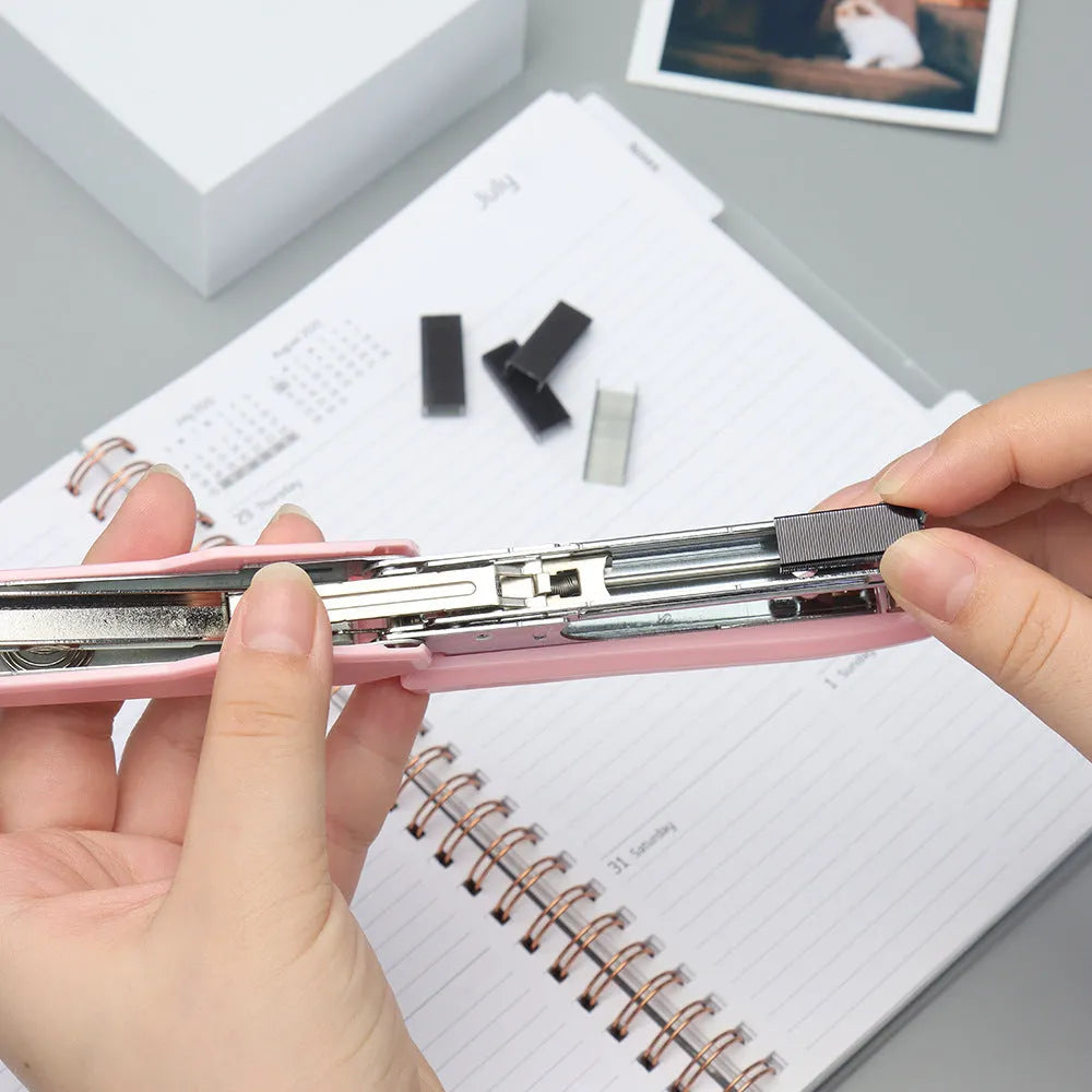 Box of 1000 metal stapling needles in rose gold, black, purple, and rose red colour options.