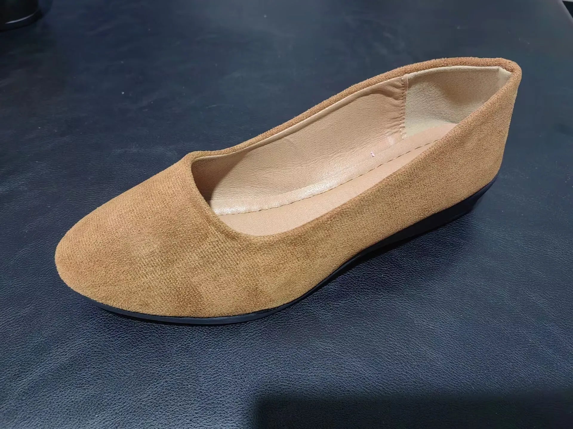 Women's pointed toe wedge pumps with suede upper and shallow mouth cut in light brown
