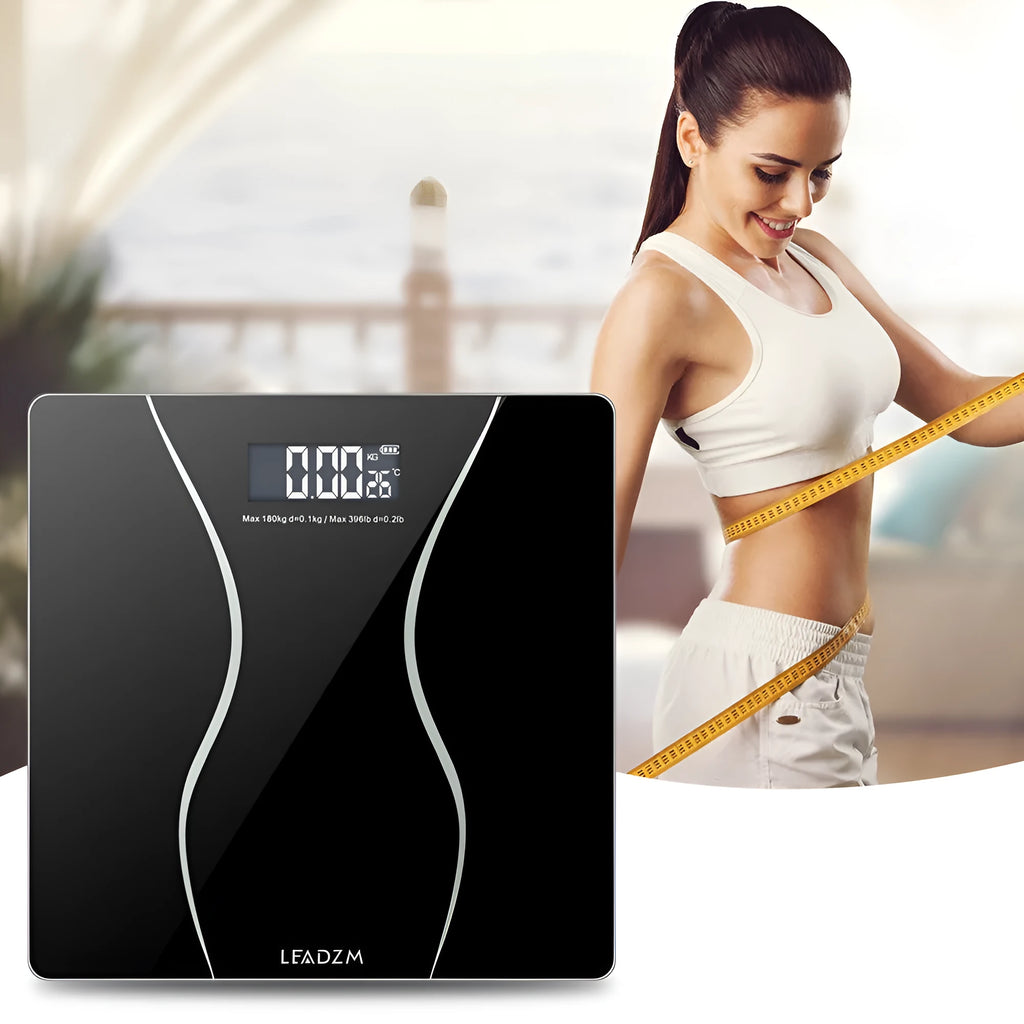 Black electronic digital bathroom scale with 180kg capacity for weight measurement