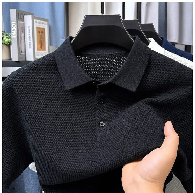 Loose fitting short sleeve cotton sweater in a neutral colour, showing pullover style and casual fit.