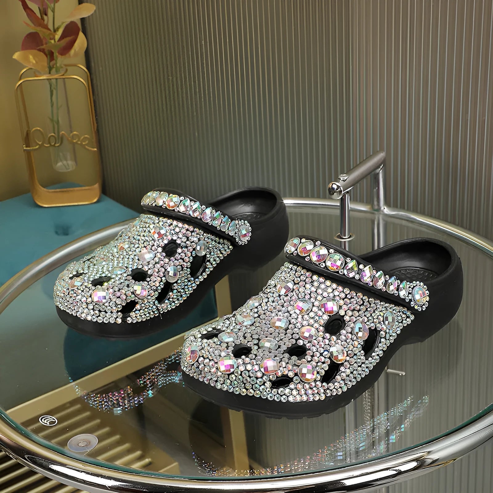 Black women's platform sandals with rhinestone details and a hole-patterned EVA upper.
