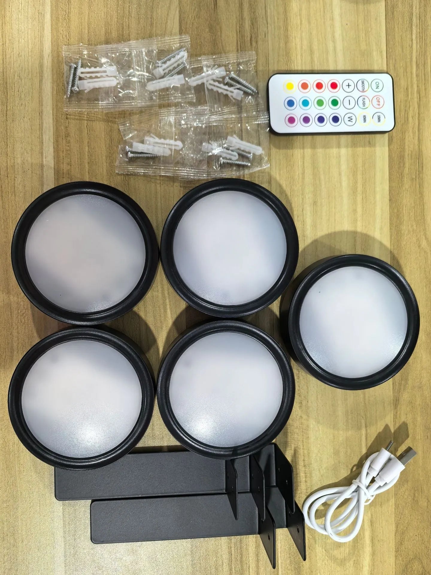 Wireless LED painting lamp with magnetic charging and remote control in black, white or gold finish
