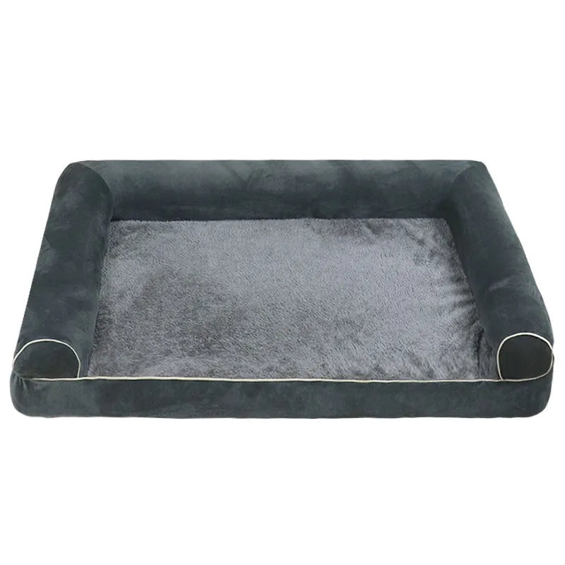 A square, cloth-covered sponge dog bed shown in blue, with a dog resting on it.