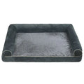 A square, cloth-covered sponge dog bed shown in blue, with a dog resting on it.
