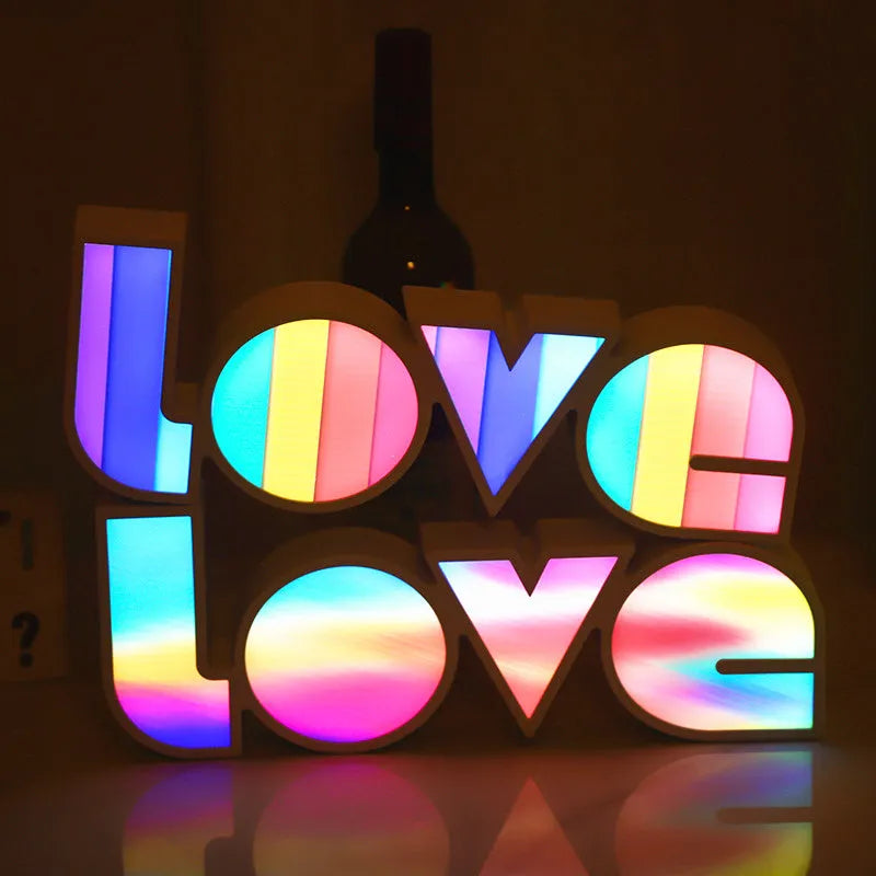 Rainbow style LED LOVE light decoration with plastic shell measuring 35.5cm by 13.5cm