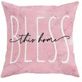 Short velvet square cushion cover with cherry blossom letter print, shown in one of four colour options.