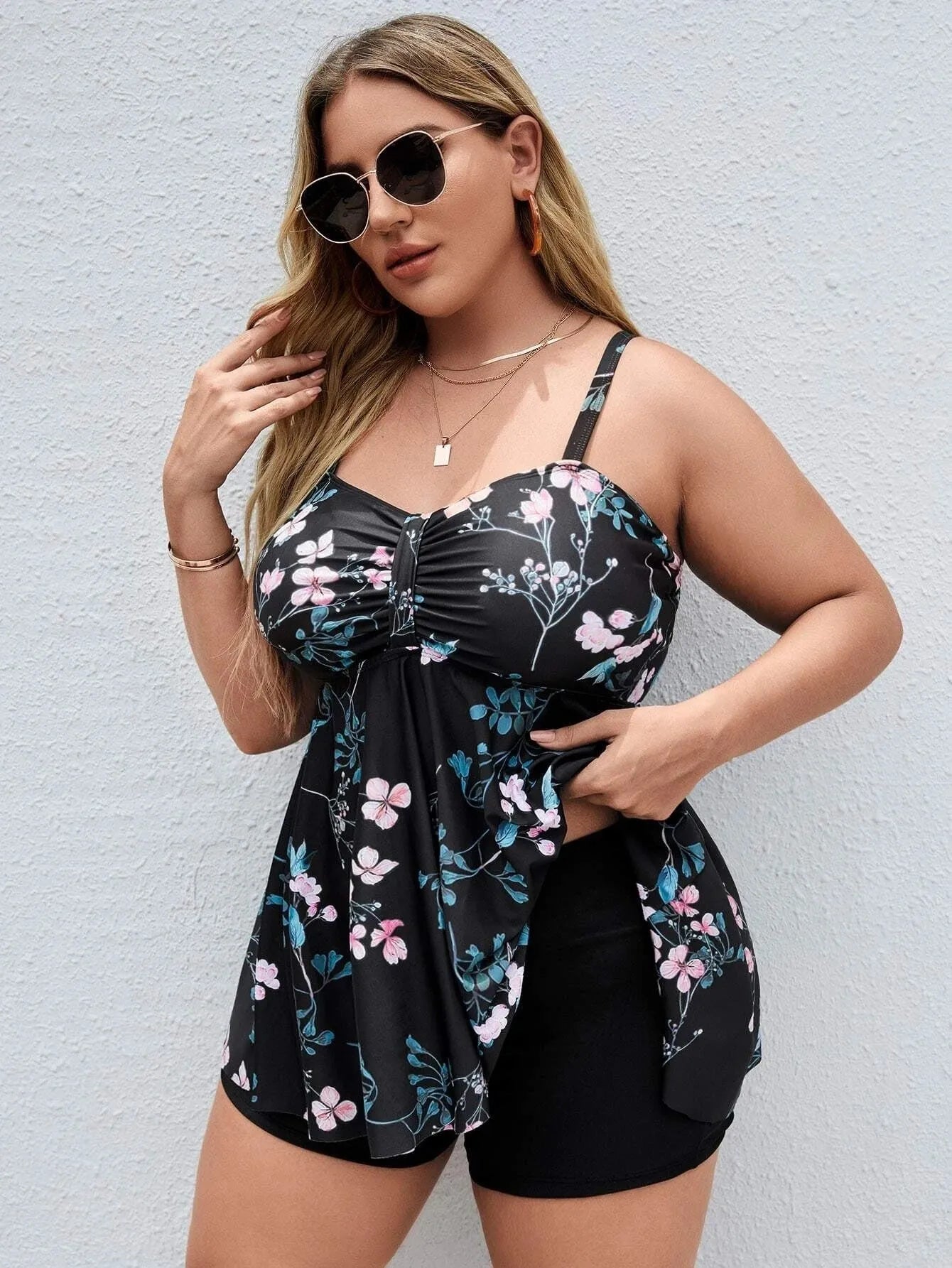Women's floral print one-piece swimsuit with split colour design in sizes 0XL to 4XL