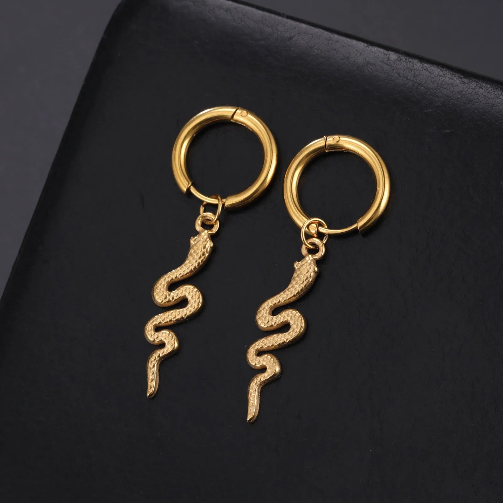 Stainless steel snake-shaped vintage clip earrings with electroplated gold finish and animal zodiac design