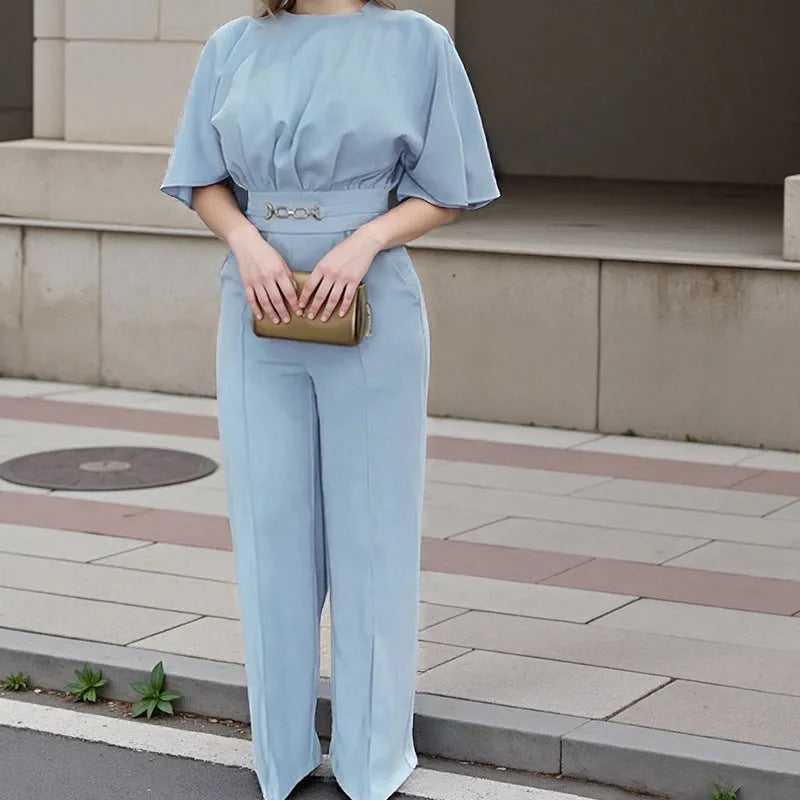 Blue men's two-piece suit with long sleeve jacket and trousers on a hanger