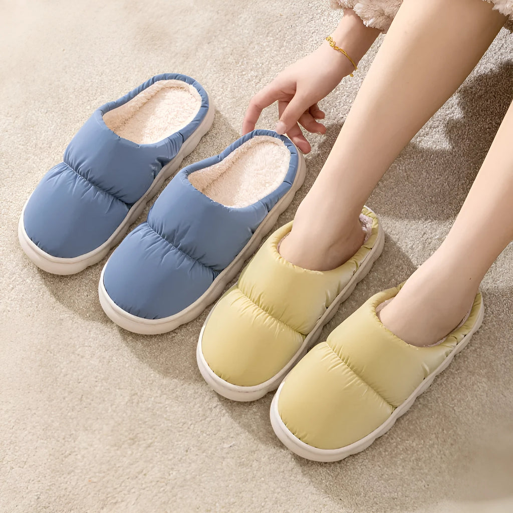 Blue plush indoor slippers with thick rubber sole and artificial fur lining