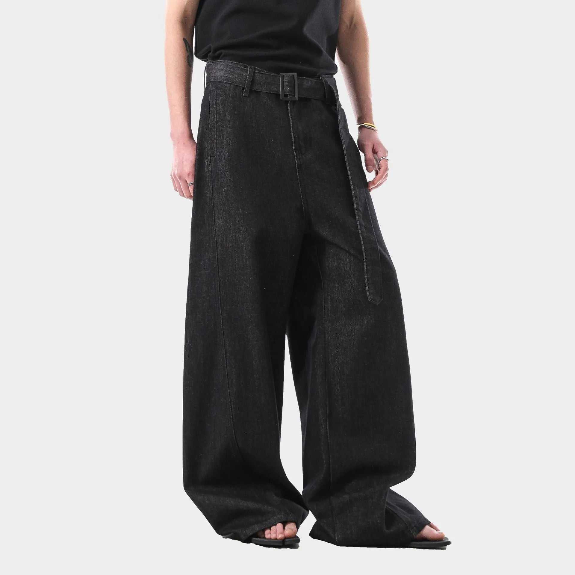 Black high-waist straight-leg denim jeans on a neutral background.