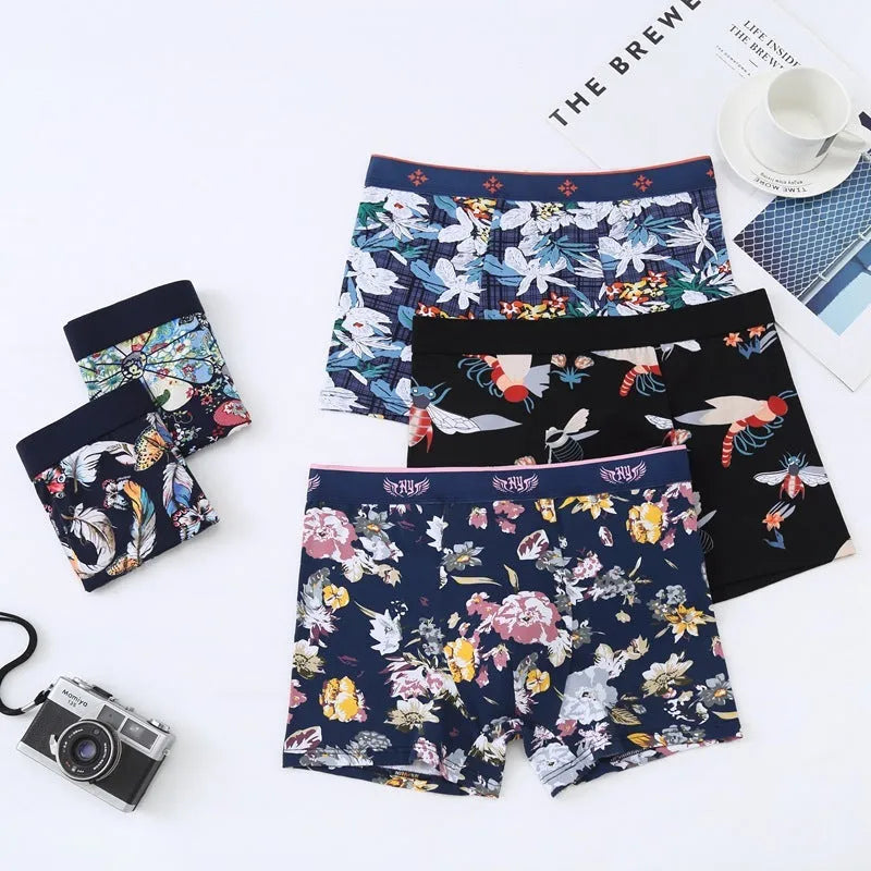 Men's cotton boxer shorts in a floral pattern, showing the mid-waist fit and U-shaped convex design.