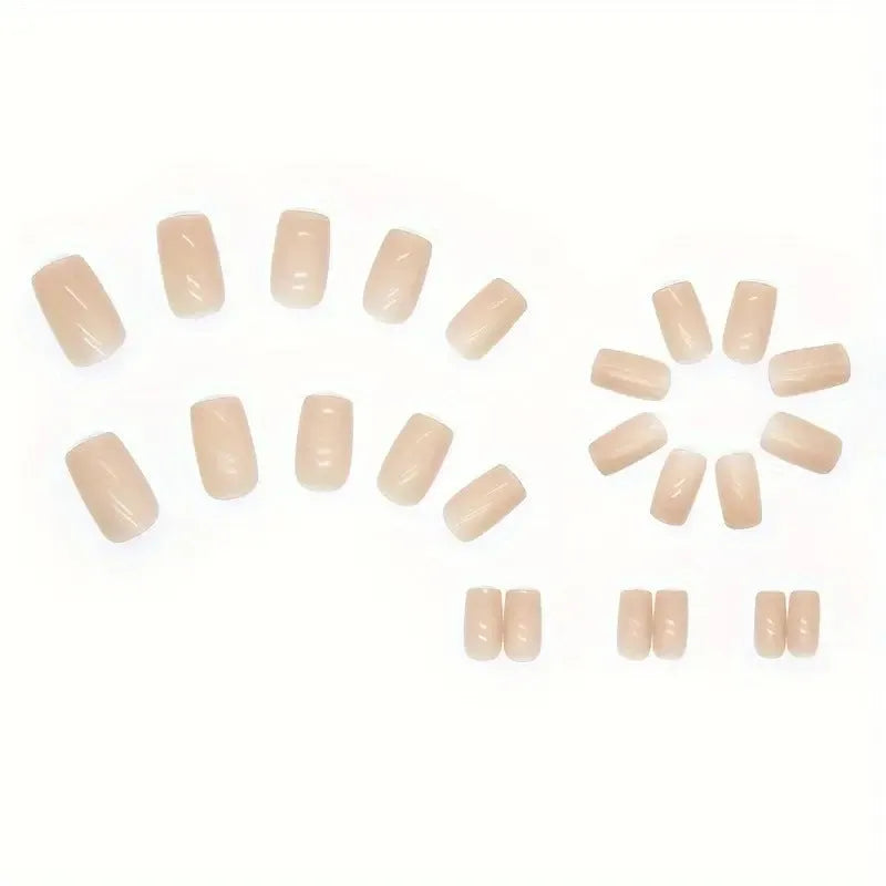 A set of solid light pink false nails (colour MY119) arranged on a card, showcasing their cute style and plastic construction.