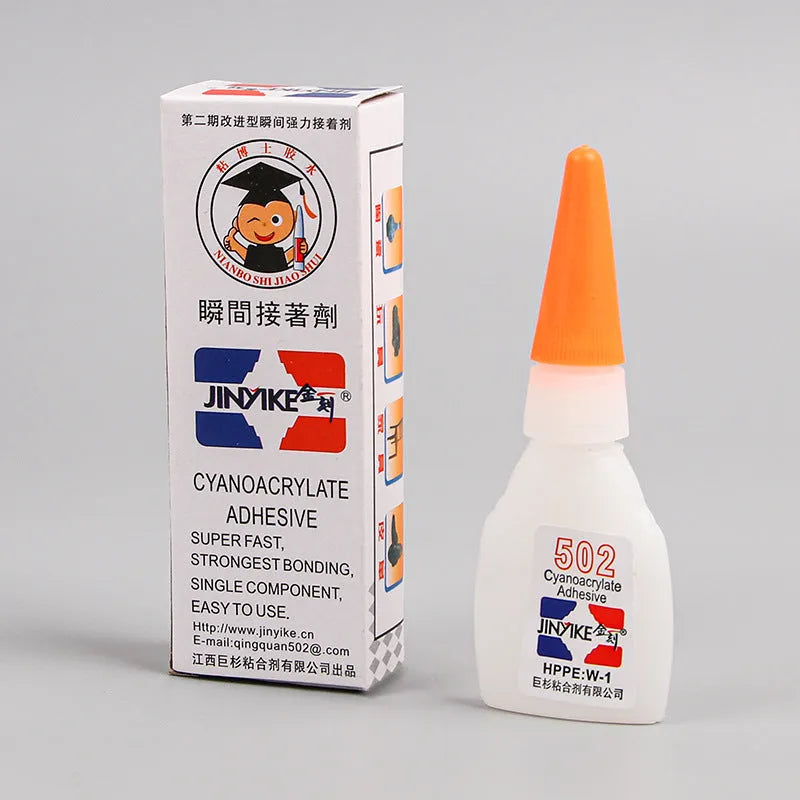 Instant strong shoe repair adhesive in 3G and 8G sizes with application tool