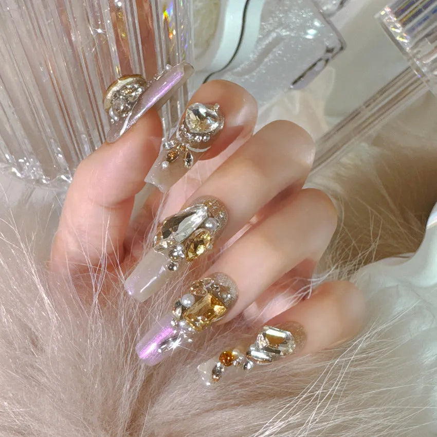 Rhinestone-decorated press-on false nails displayed on card paper packaging with size S classification