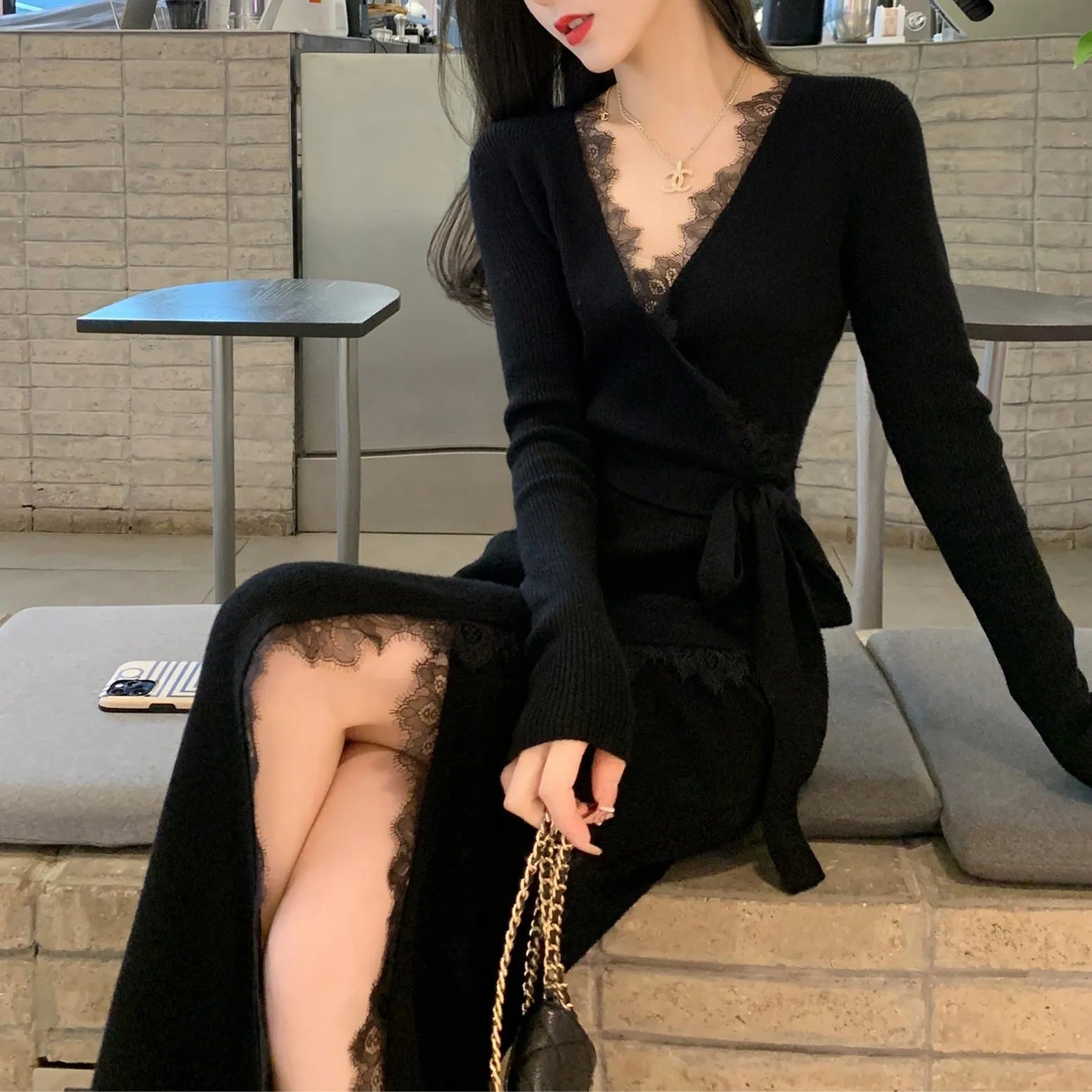 Black slim fit woolen skirt with princess dress styling on dress form