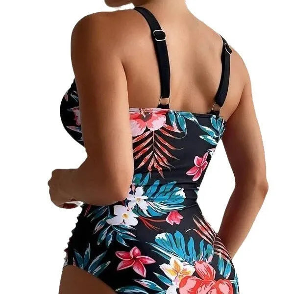 Backless floral one-piece swimsuit for women in a high-stretch polyester-spandex fabric.