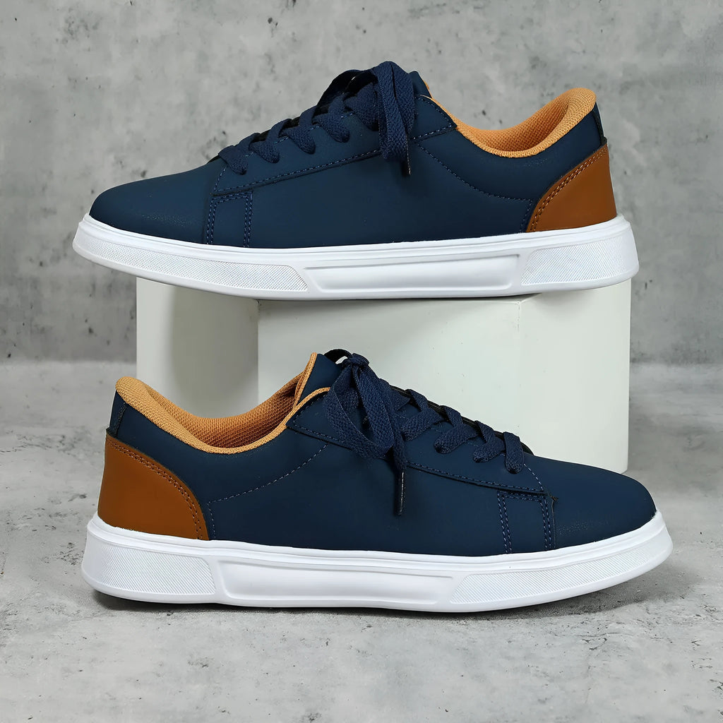 Low-top platform skate shoes with cross-strap detail and mid-heel design in beige brown colour