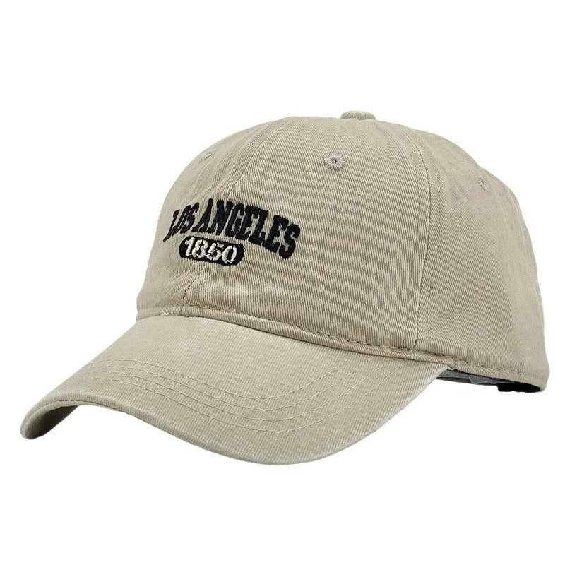 Retro adjustable peaked cap with distressed embroidery in conical crown design