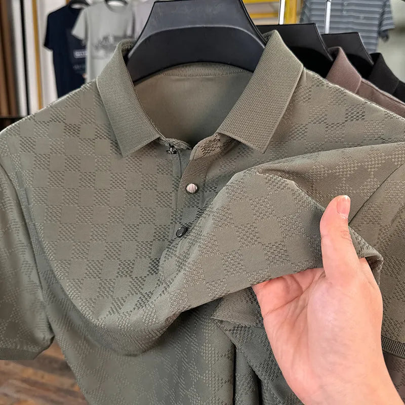 Man wearing a black rhombus weave thin ice silk short sleeve T-shirt with a slit detail.