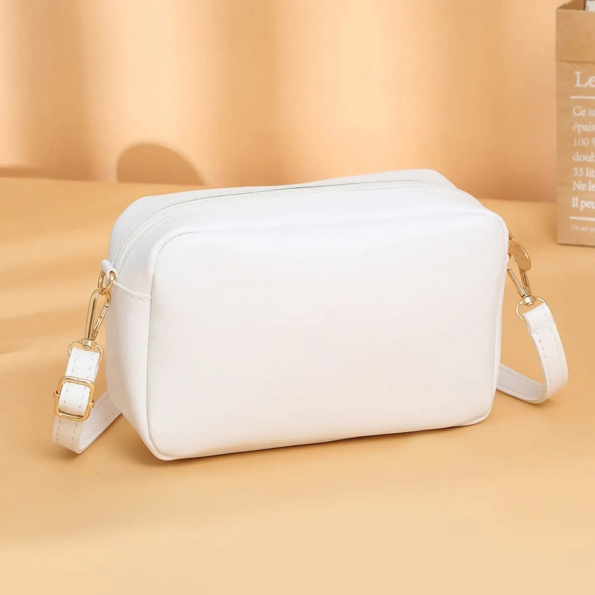 Women's solid colour PU shoulder bag with three-dimensional pockets in horizontal square shape