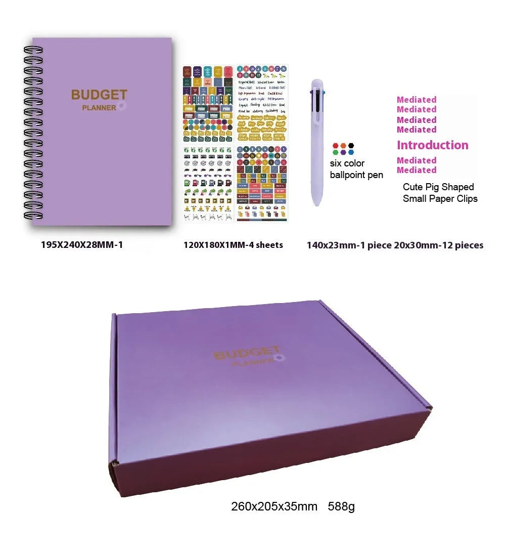 Purple coil-bound budget notebook open showing monthly planning pages with financial stickers and paper clips