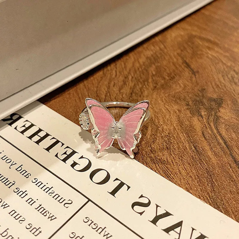 Copper women's ring featuring a creative Chinese butterfly design, available in multiple colours.