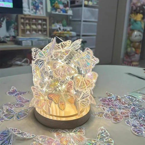 Butterfly night lamp with glass shade on wood base, bedside ambience lighting