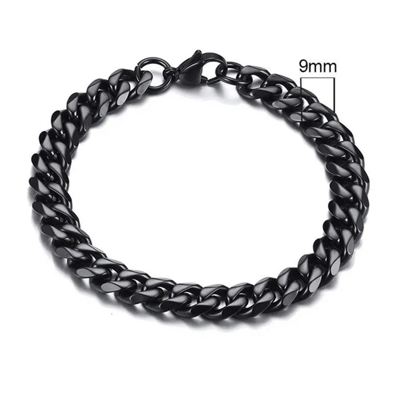 Six-sided geometric link metal bracelet in gold colour on a wrist.