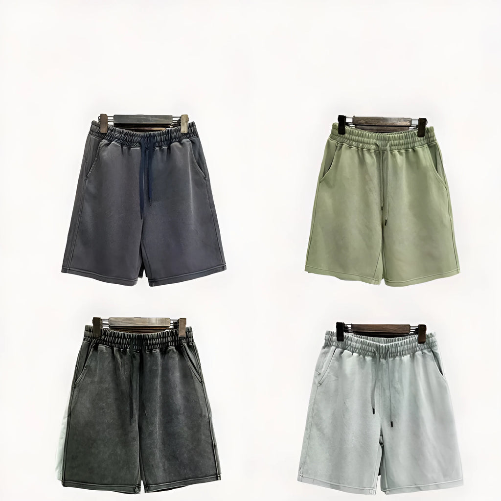 Men's cotton shorts with distressed detailing in straight-leg loose fit casual style