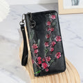 Embossed hand-painted Chinese floral pattern handbag with zipper closure in black colour option