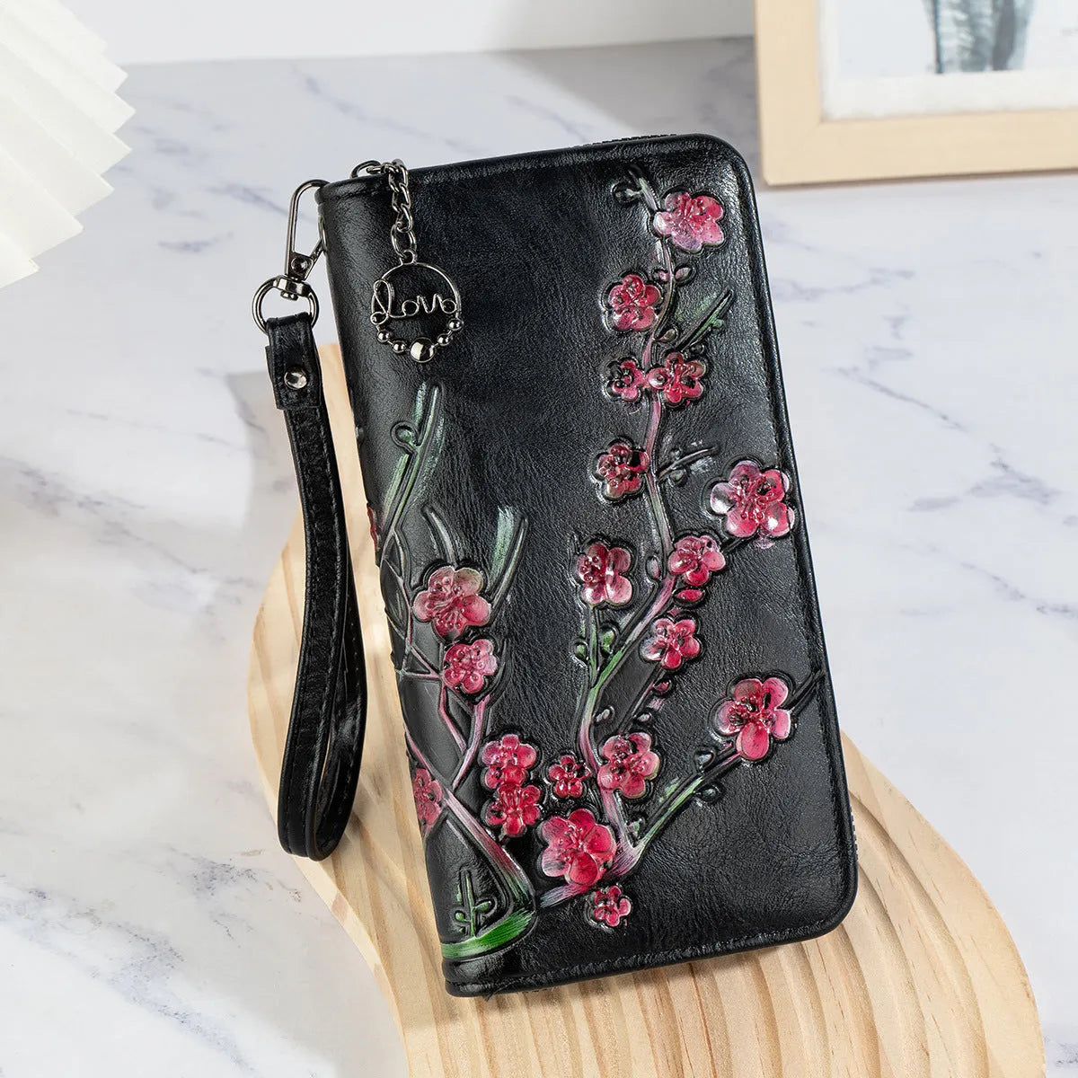 Embossed hand-painted Chinese floral pattern handbag with zipper closure in black colour option