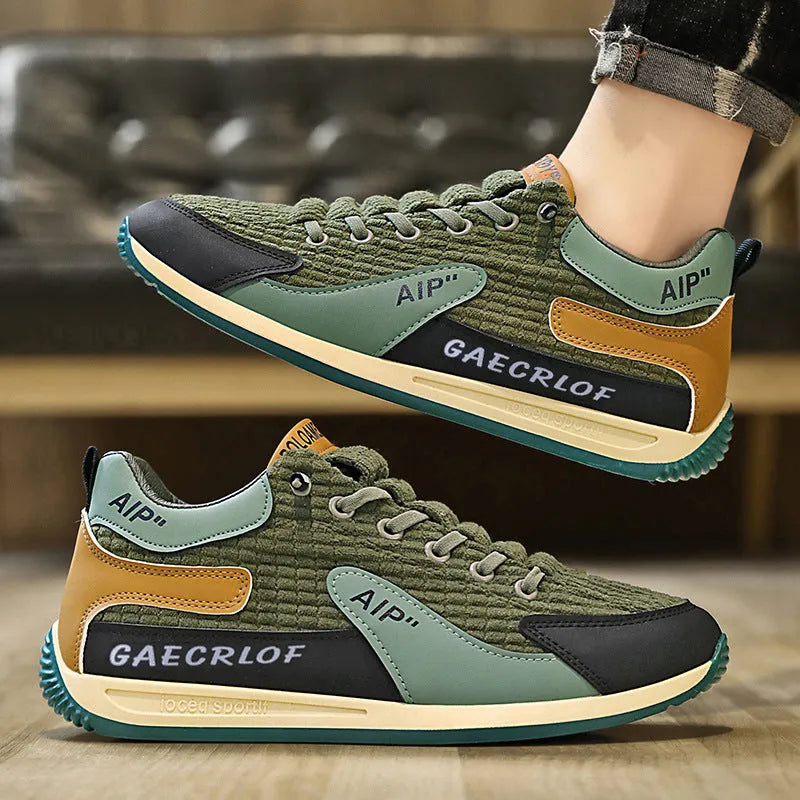 Men's grey mesh running shoes with lace-up closure and round toe design