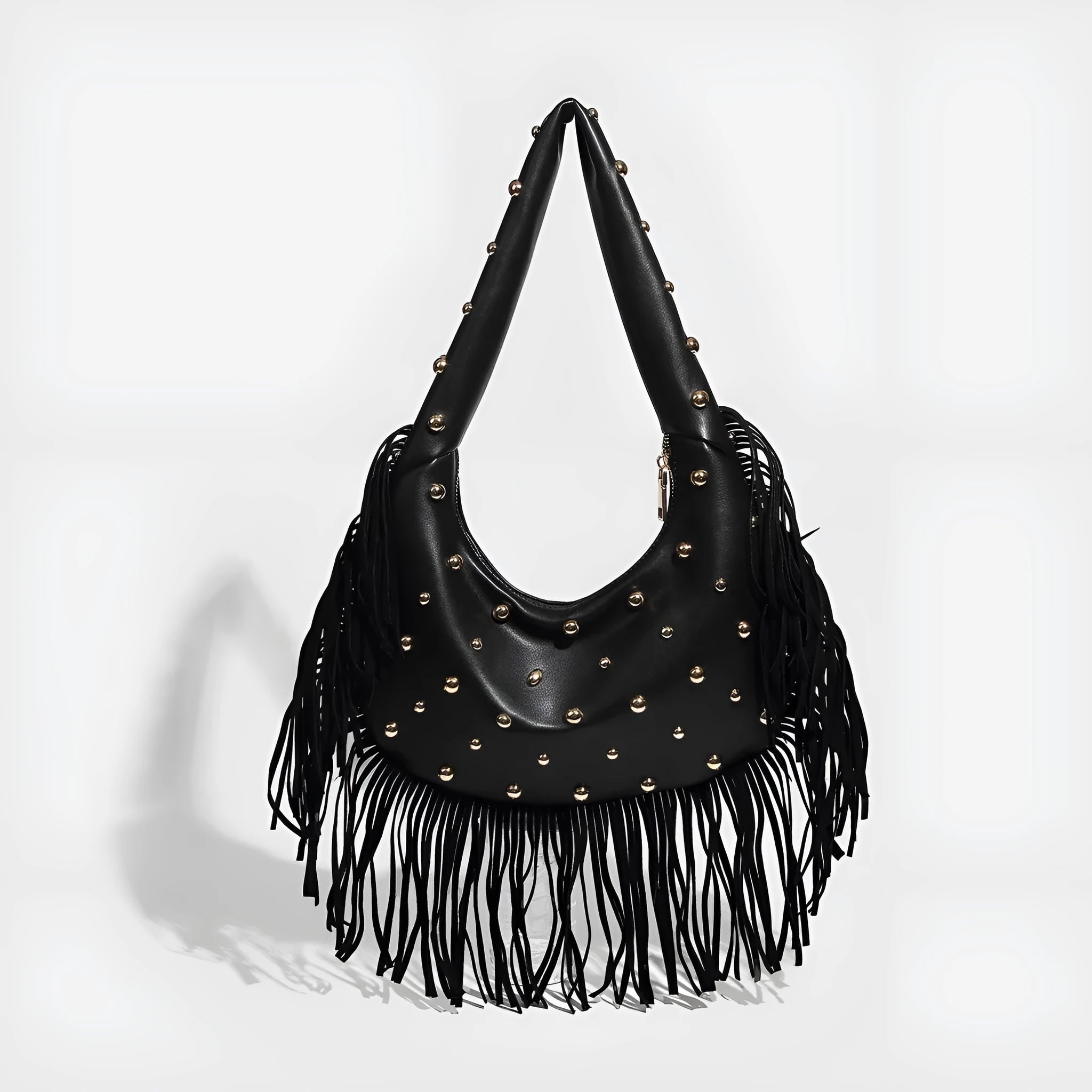 Black retro shoulder handbag with a tassel and an internal mobile phone compartment.