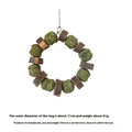 Applewood and woven straw ball chew ring toy for small pets on a white background.