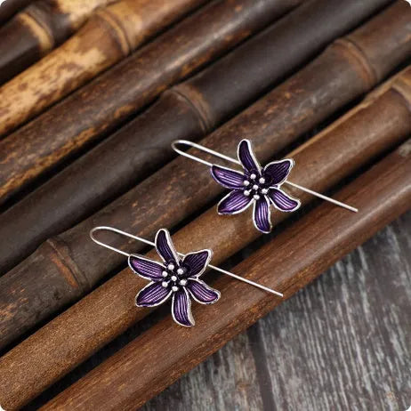 Purple flower shaped alloy earrings with electroplated finish retro design