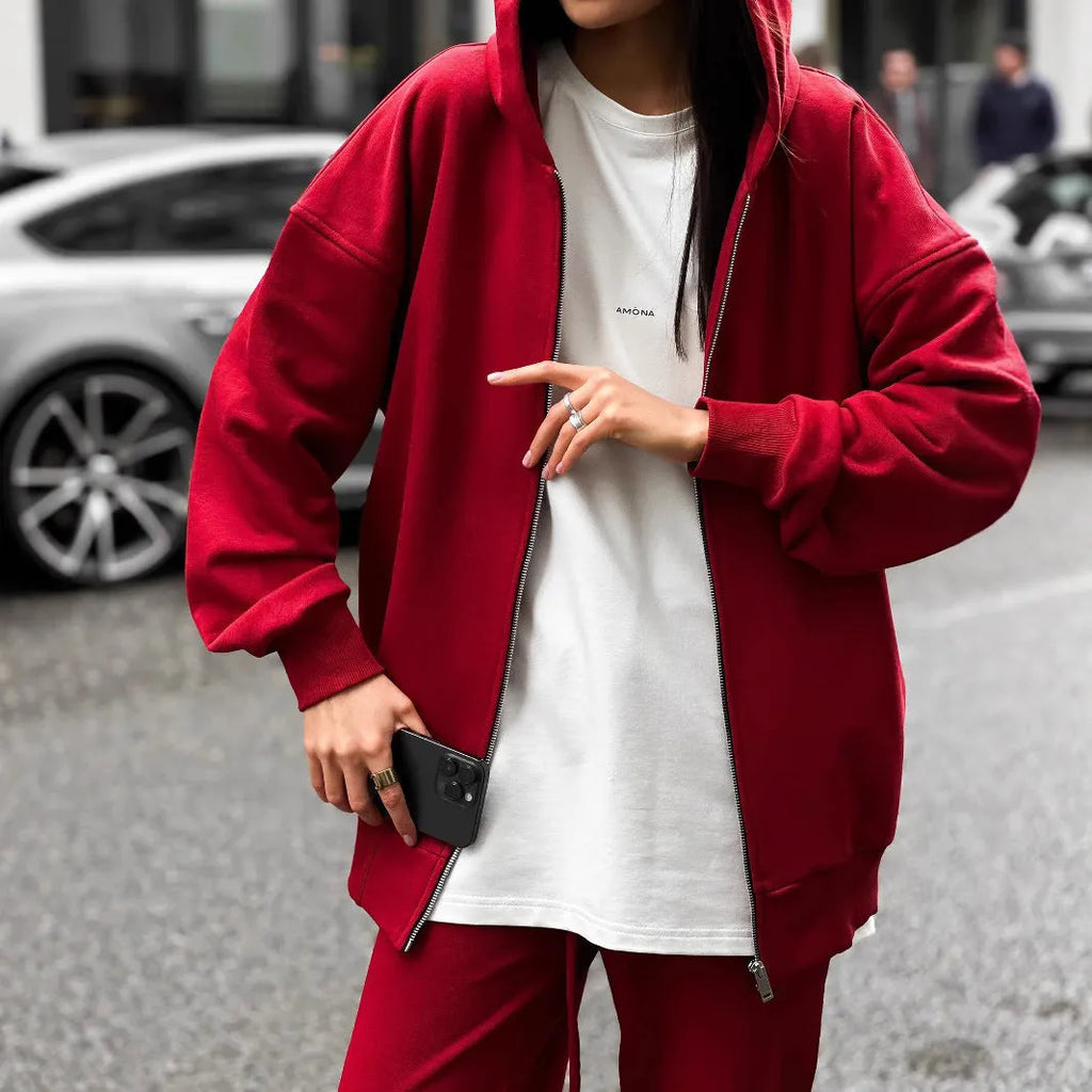 Loose fit red polyester street style coat and trousers two-piece set on a hanger