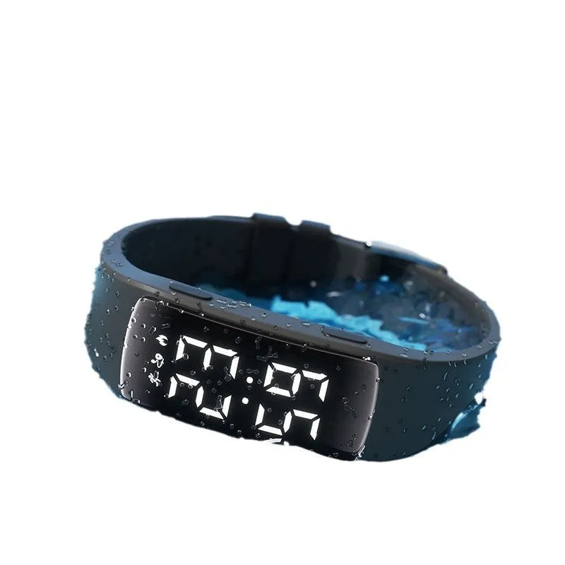 Vibration alarm smart watch with LED display on a silicone strap, shown in a choice of colours.